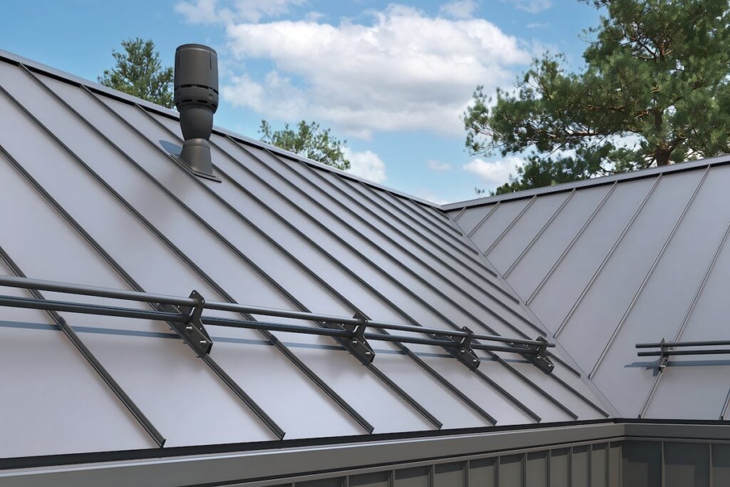 Close-up house retro roof panel with standing seam and fasteners. 
