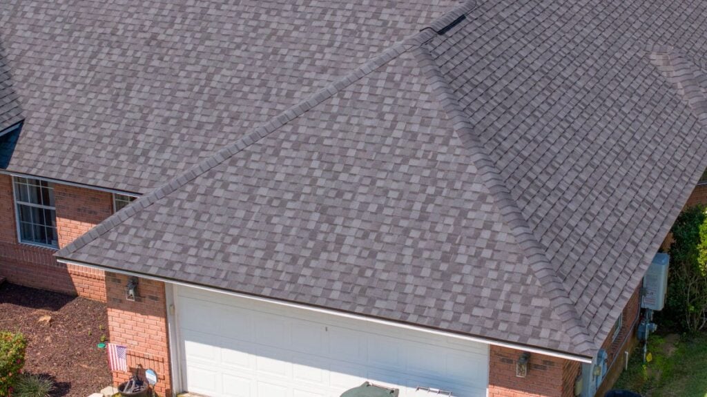 DIY roof replacement Quality Roofing Solutions project charcoal shingles big house