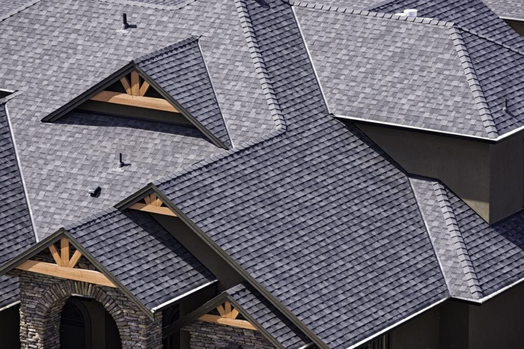 How to install architectural shingles huge house charcoal roof aerial view
