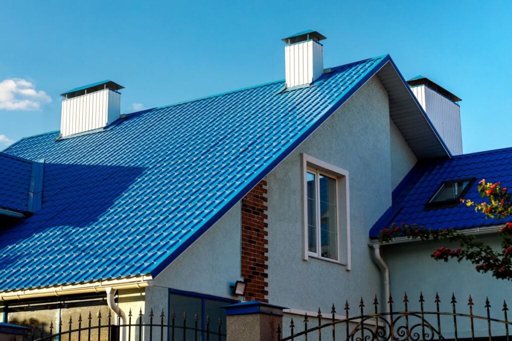 Minimum slope for metal roof blue house tiles flowers blue sky