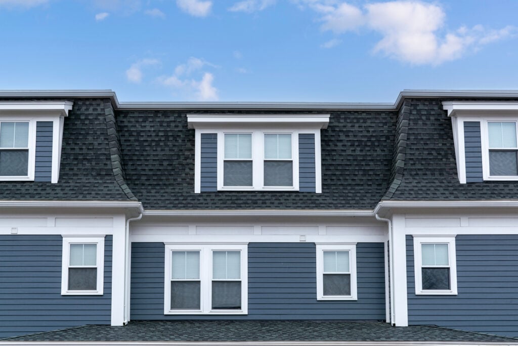 mansard roof blue siding
