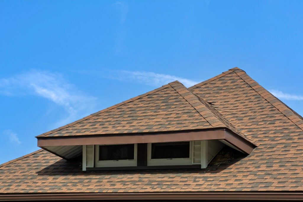 hip roof brown shingles roof