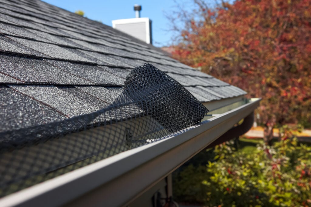 gutter guard installation on shingles roof