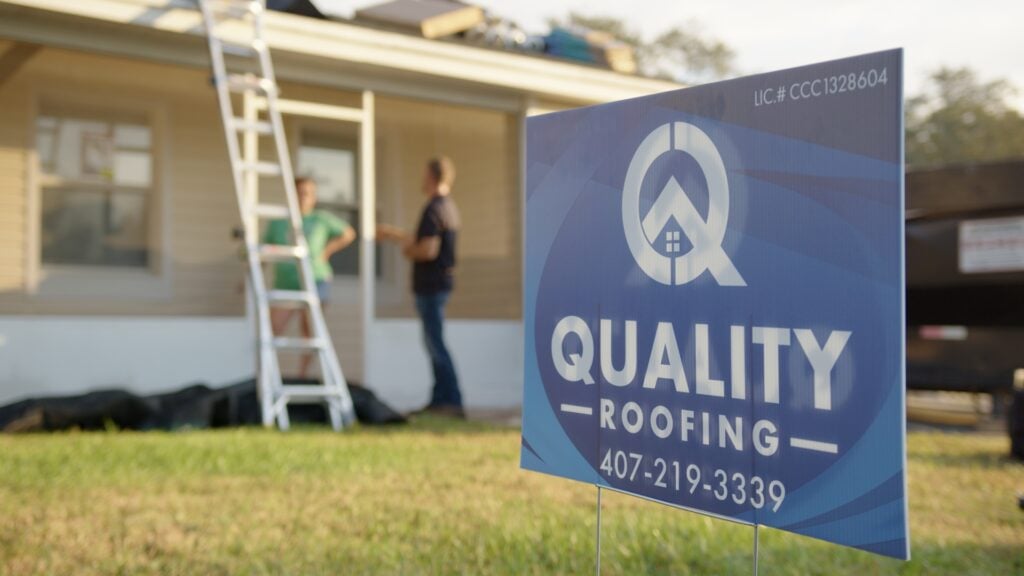 roofing company repairing roof