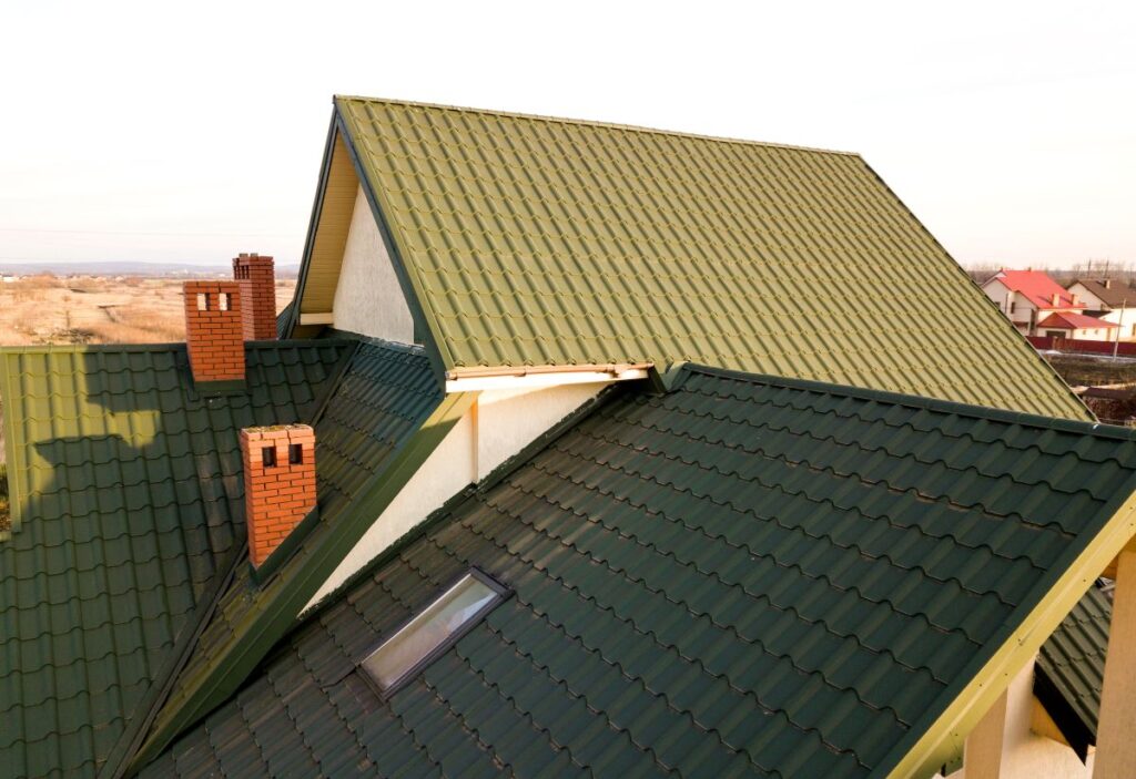 green metal shingles huge house roof