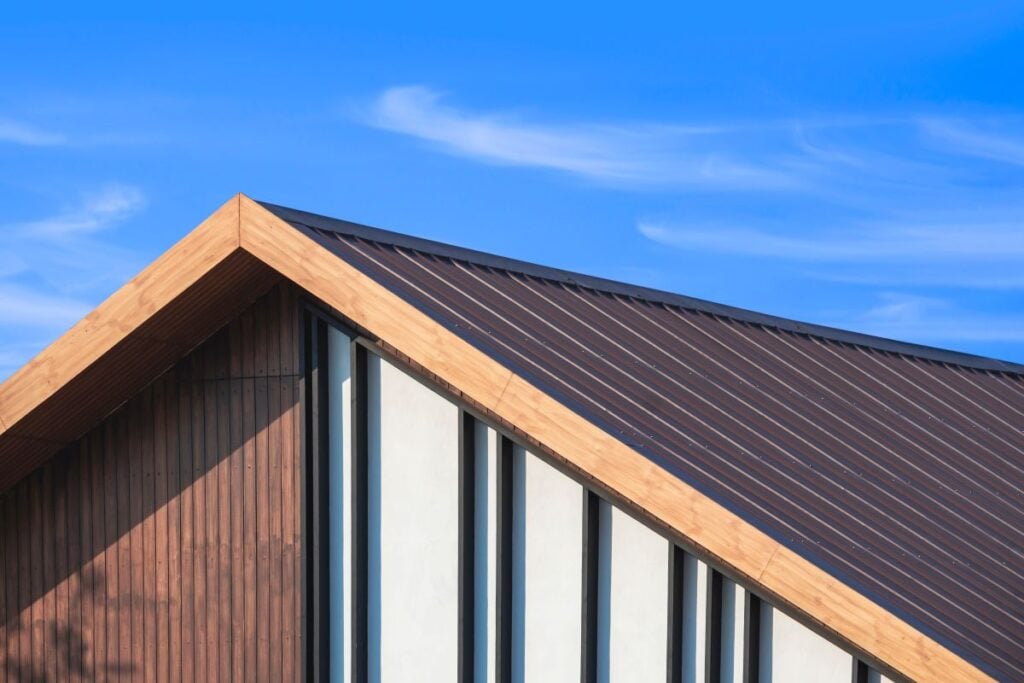 hip roof vs gable roof brown wooden siding